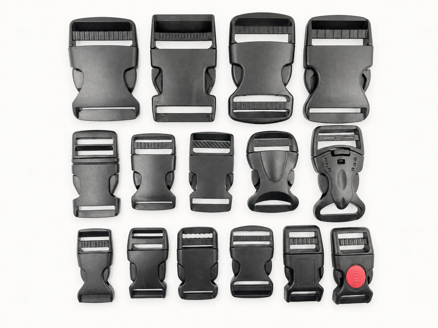Assorted black plastic side release buckles in multiple sizes and styles