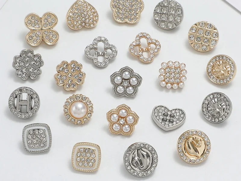 geometric crystal buttons in floral and heart shapes