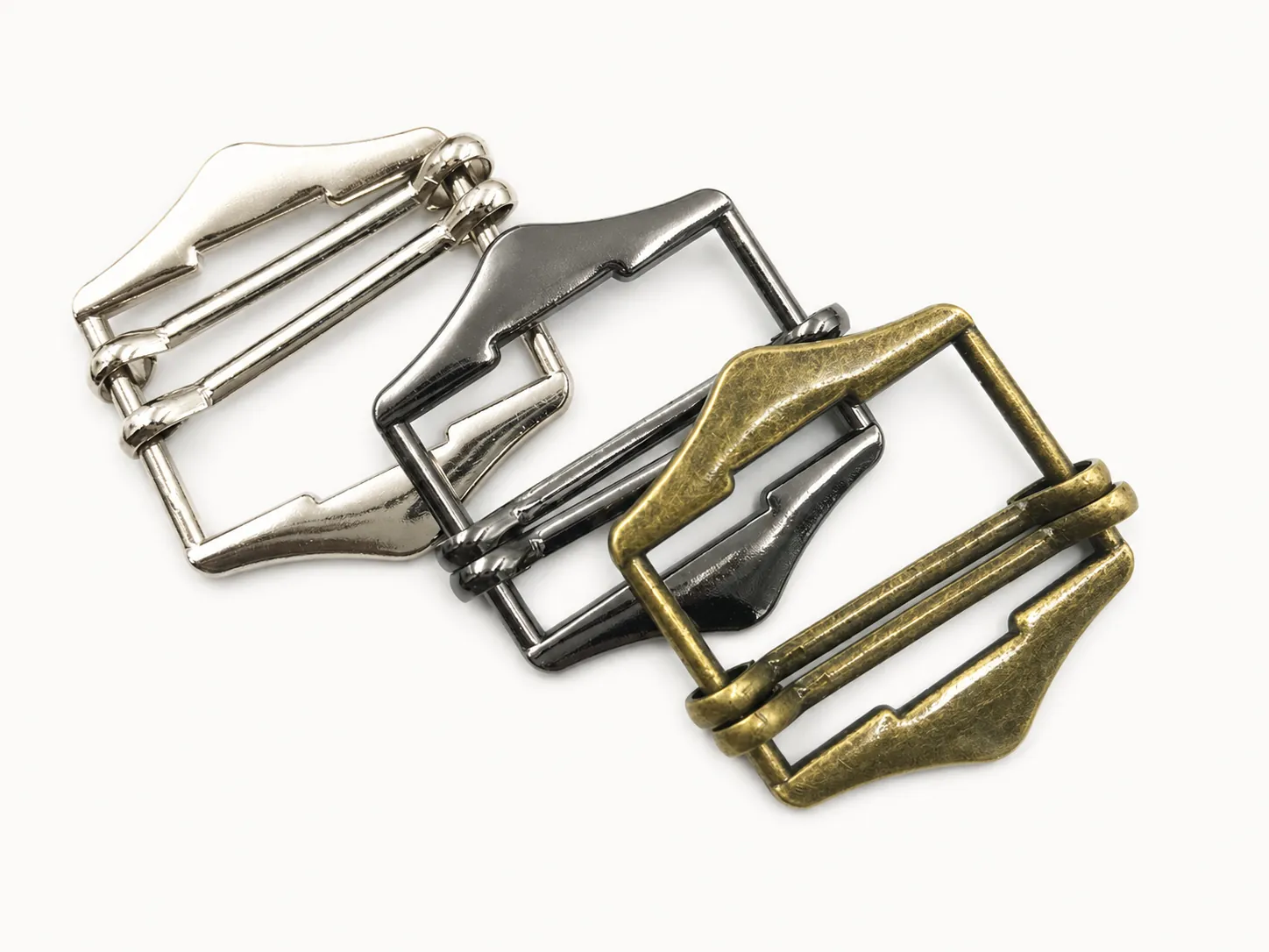 decorative metal belt buckles in silver gunmetal and antique brass finishes