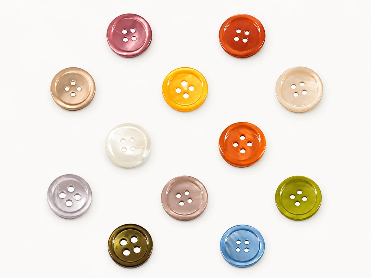 dyed translucent shell shirt buttons in amber red green blue and pearl tones