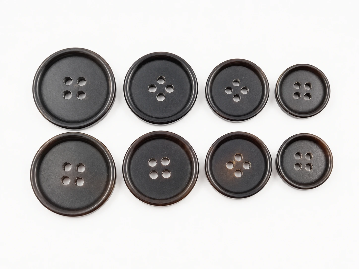 matte dark genuine horn buttons shown in coordinated size set
