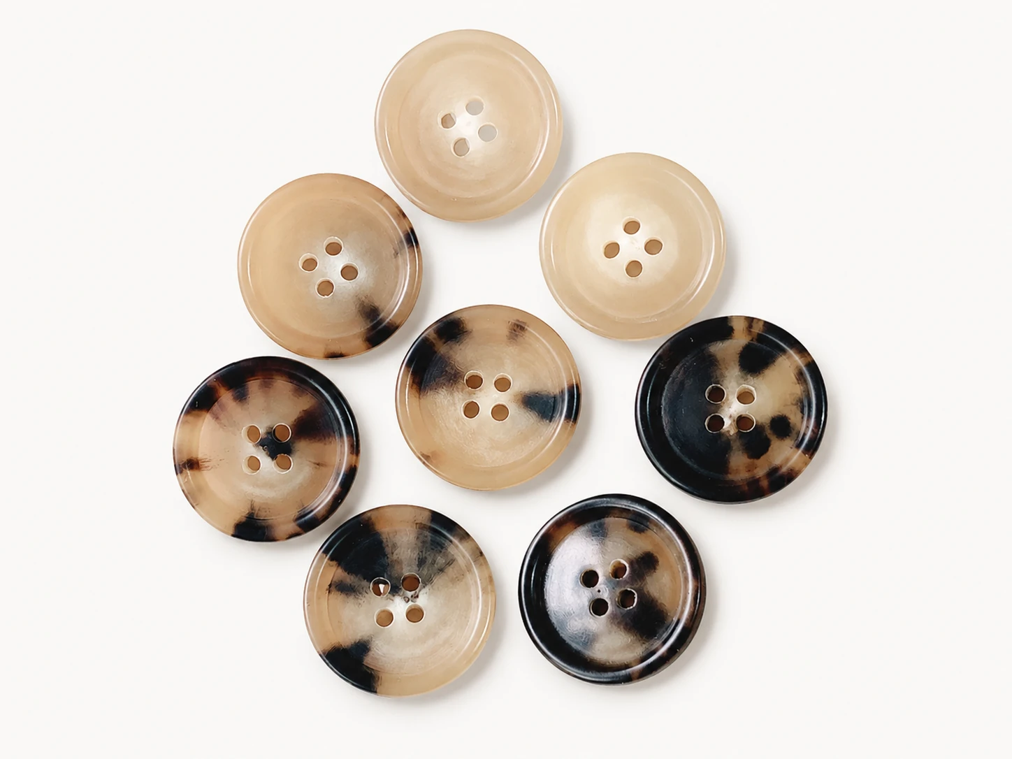 light cream and tortoise genuine horn dress buttons in coordinated sizes