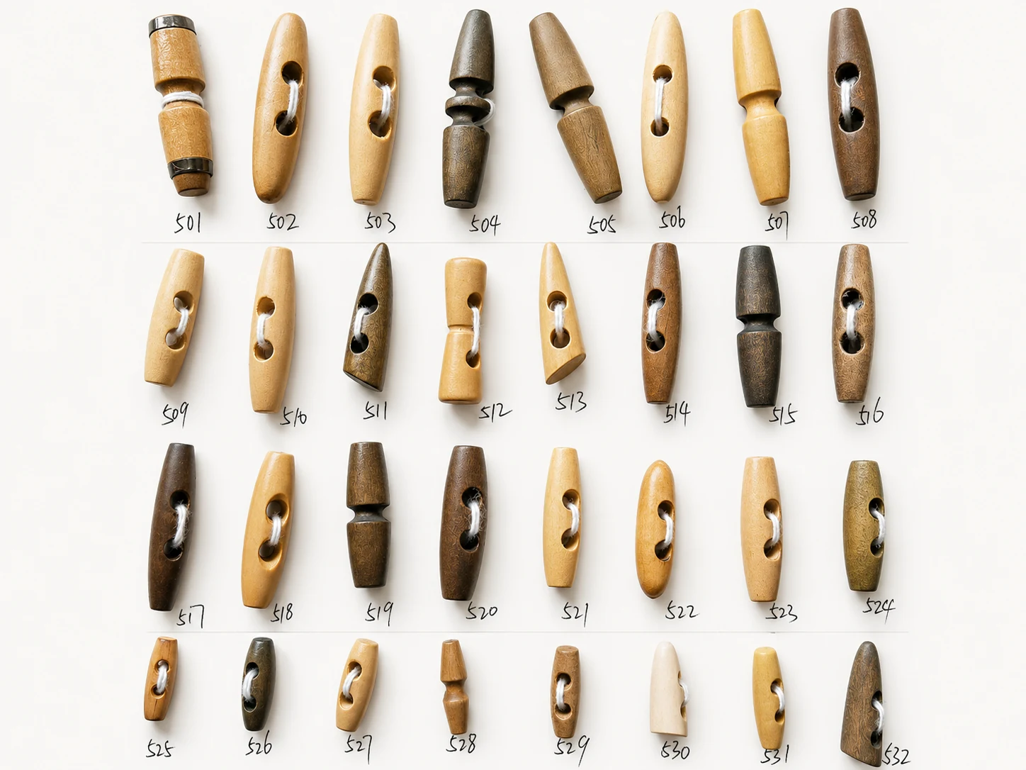 wooden toggle button collection board with assorted shapes and colors for duffle coats and knitwear
