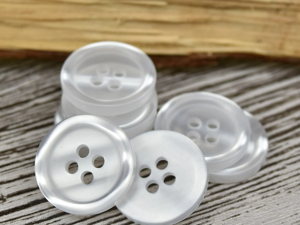 white pearl-effect four-hole resin shirt buttons