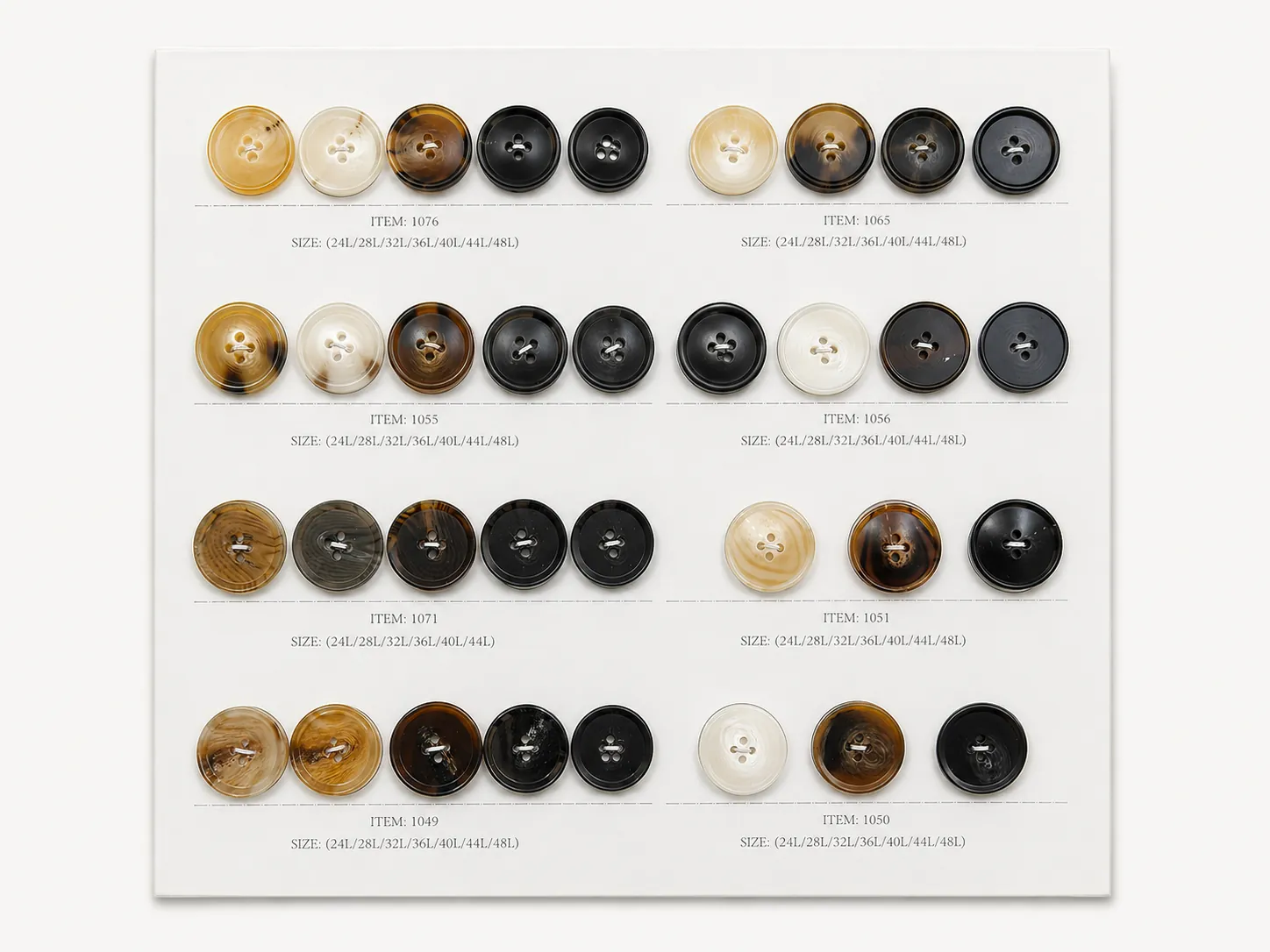 Two-hole horn-effect coat buttons sample board with amber ivory smoke and black styles
