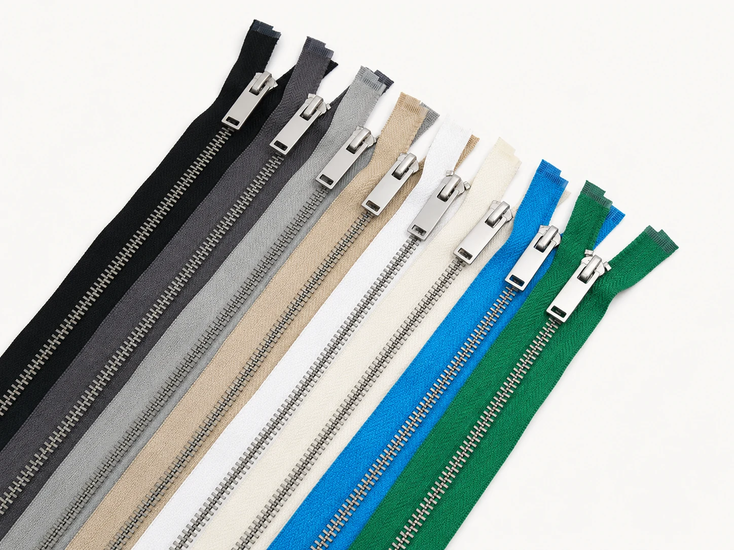 Assorted metal garment zippers with auto-lock sliders in core colors