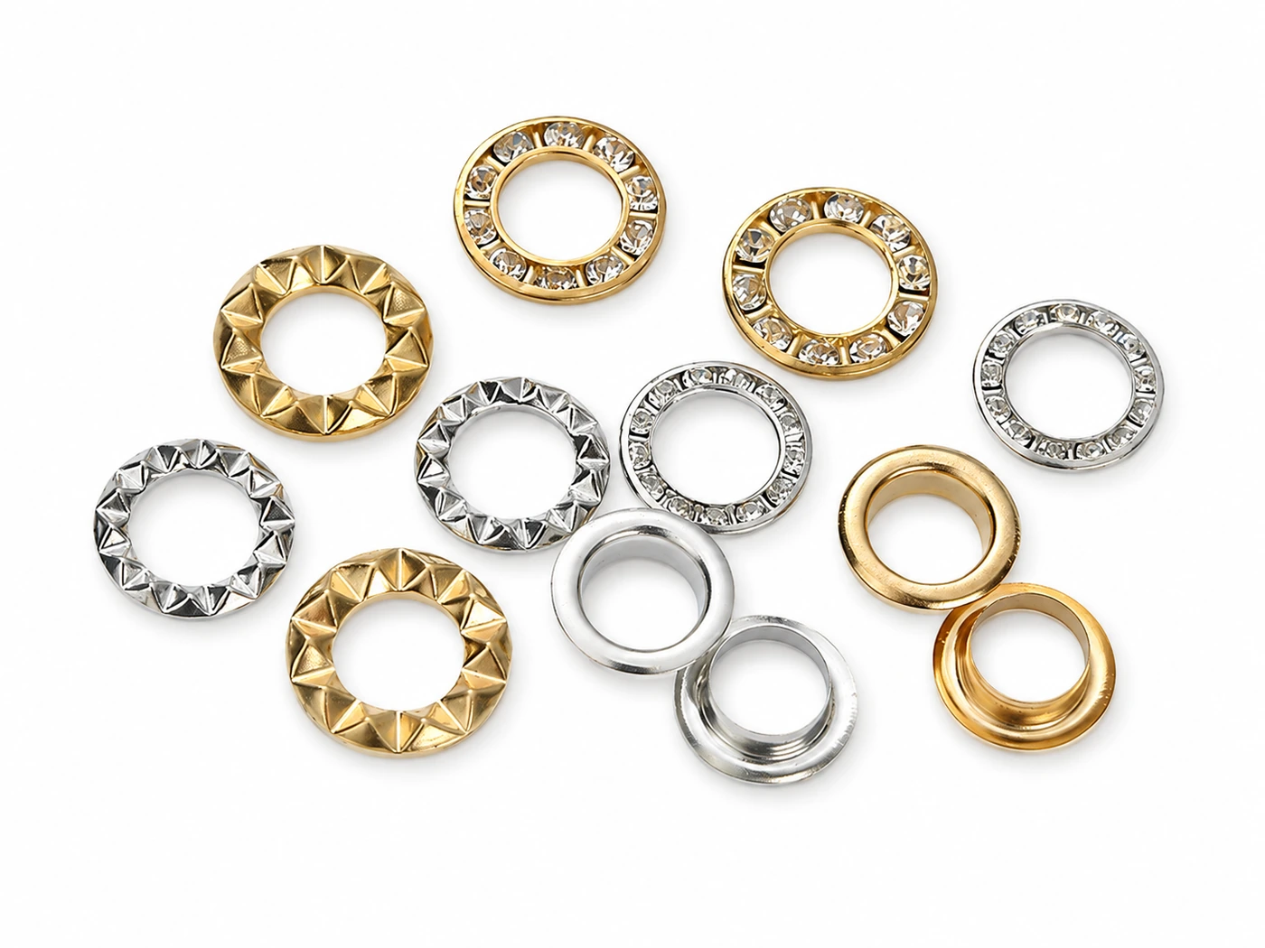 Assorted decorative eyelets and washers in gold and silver finishes