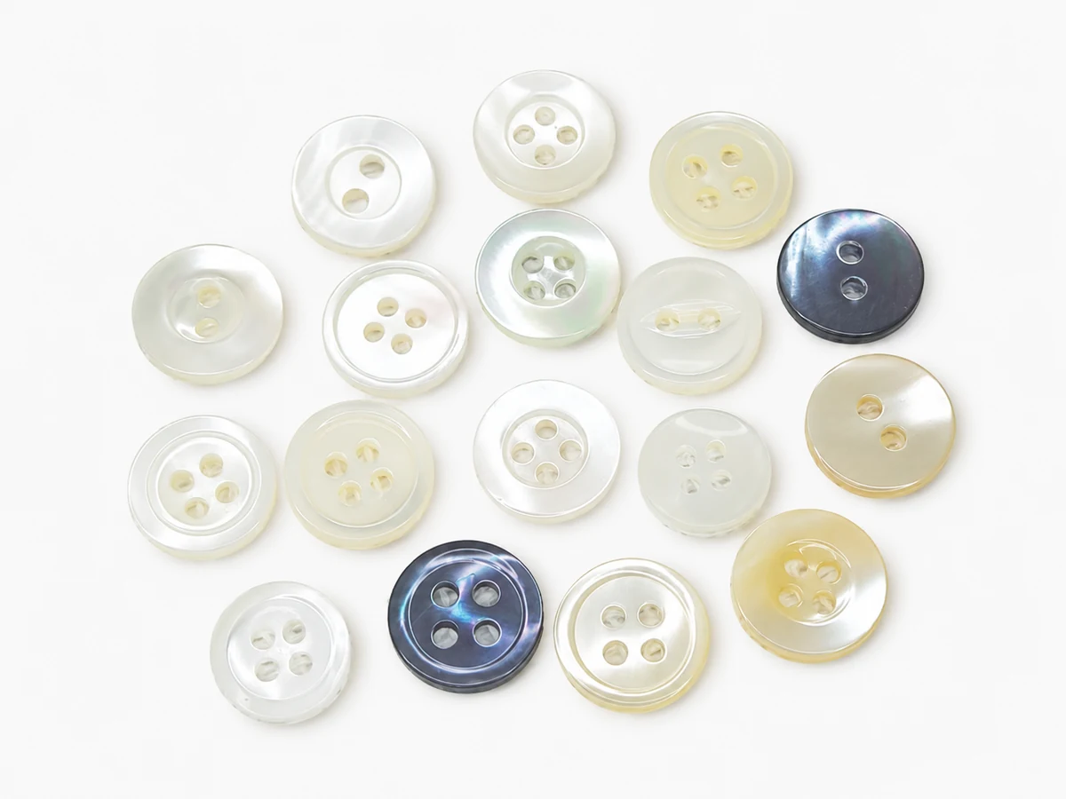 Assorted mother of pearl shell, corozo and horn natural buttons