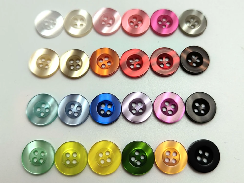 Resin and polyester sewing buttons, 4-hole, in ivory and pearl finishes
